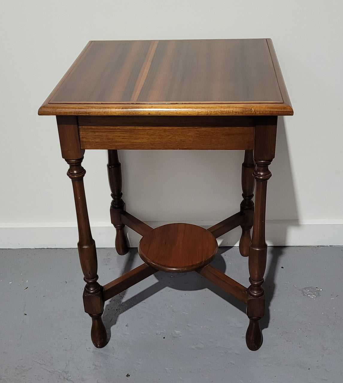 Beautiful art deco walnut occasional table. In good original detailed condition.
