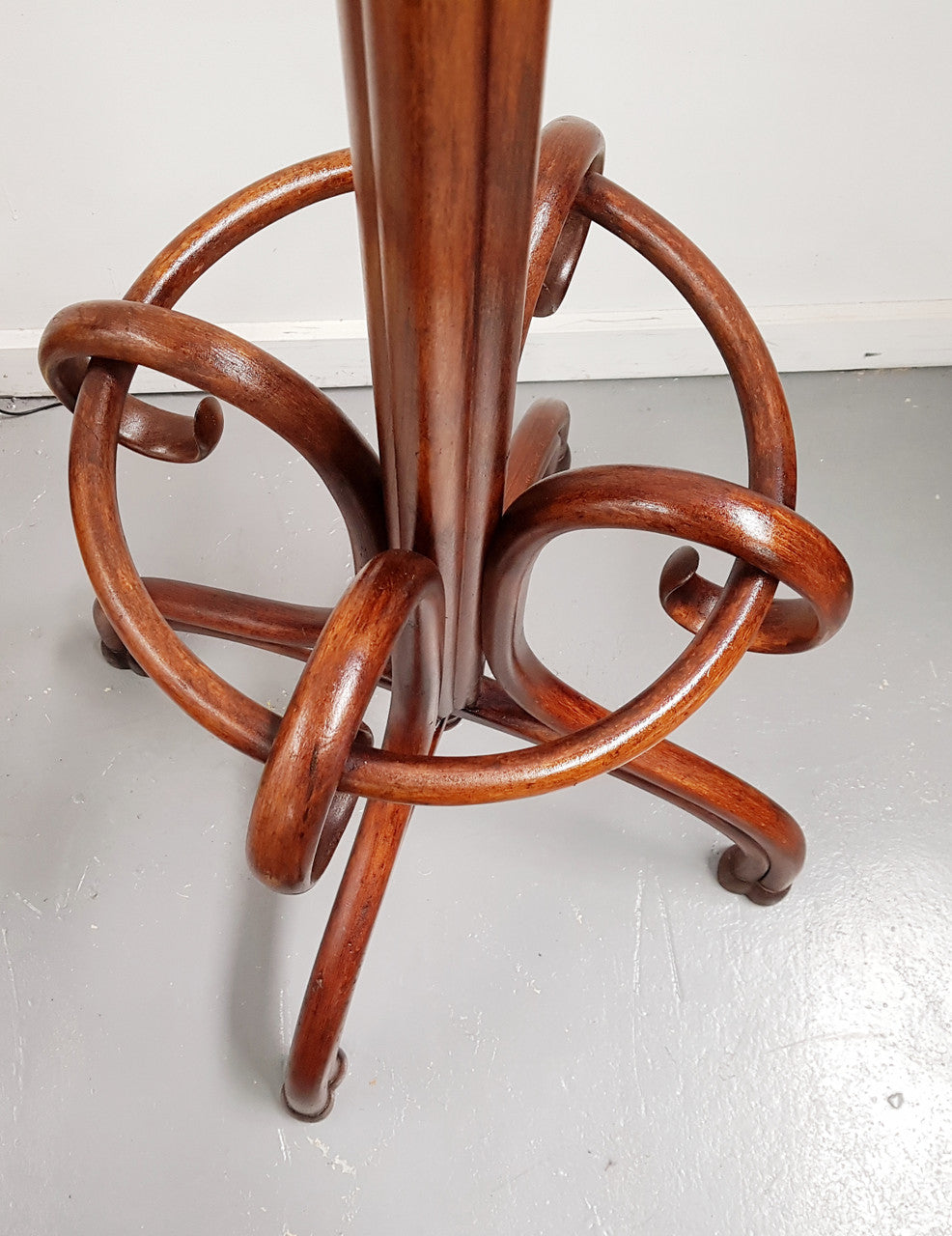 A great example of an Antique French walnut stained Thonet style hat and coat stand in very good restored condition. Very sturdy and solid. Hard to find. Circa 1900.