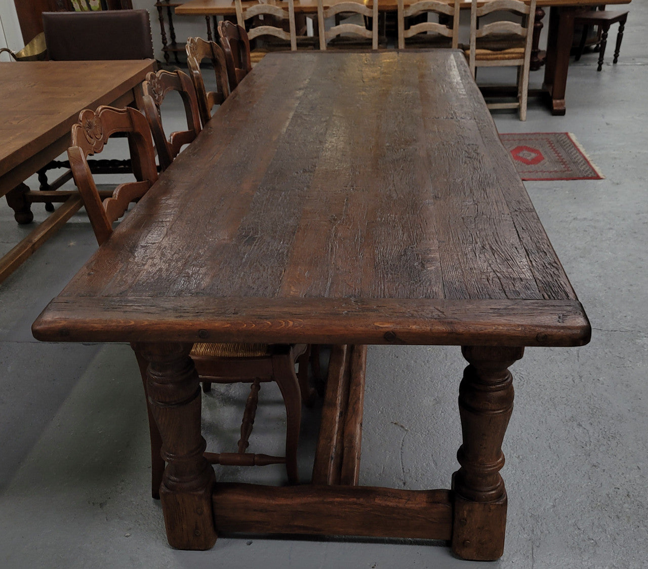 Amazing 2.65 meter French Elm Refectory dining table with loads of rustic charm. This table has been sourced from France and can comfortably seat ten people. It is in good original detailed condition.
