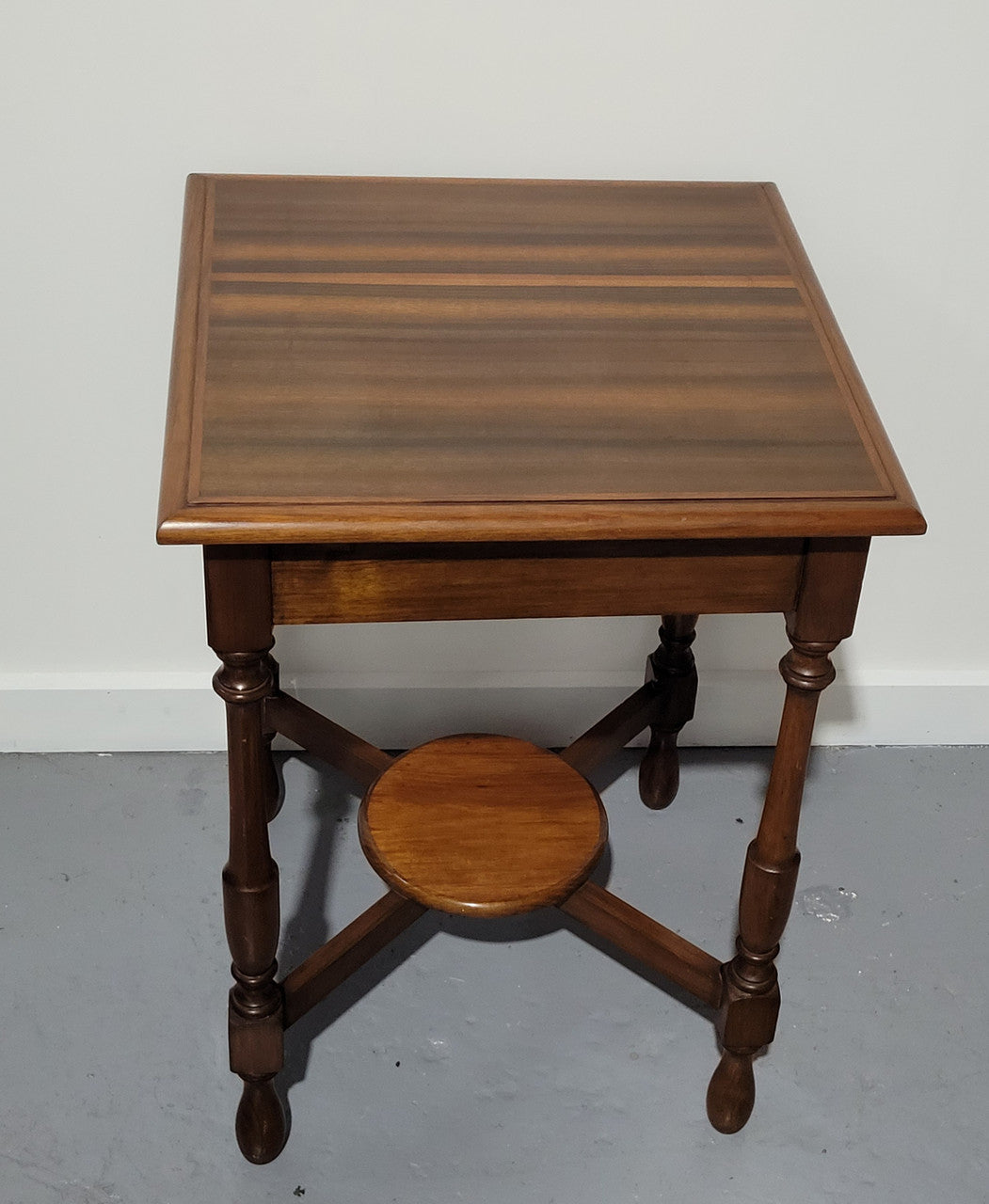 Beautiful art deco walnut occasional table. In good original detailed condition.
