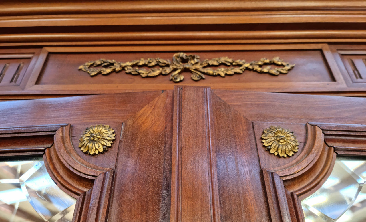 French Louis XVI style mirrored two door armoire/wardrobe. It has plenty of hanging space as well as two drawers at the bottom. In good original detailed condition.