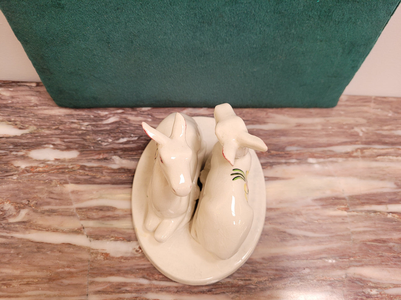 Goldscheider Myott Art Deco figurine of two Gazelle figures with hand painted flowers.  Backstamp dates the figures to 1938-1950 period.  There is some light crazing.