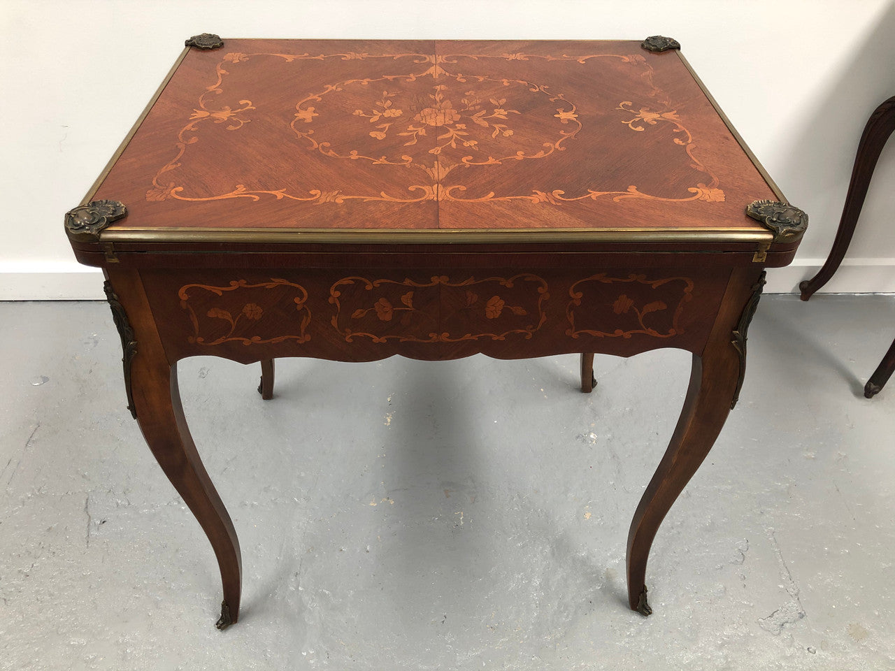 Beautiful french inlaid games table which includes internal drawers and bronze mounts. Internal drawers have counters and cards included.