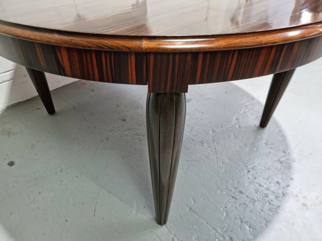 French Art Deco Macassar Ebony circular dining table by "Jules Leleu". In very good original detailed condition.