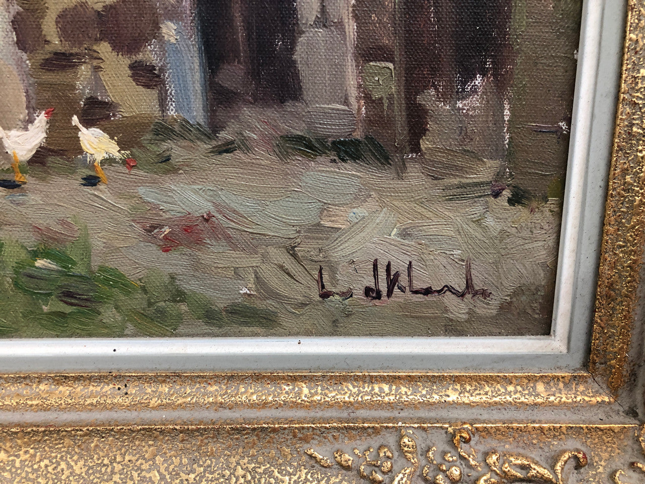Pair of Vintage framed French oil on canvas of "Village Scenes". They are both in good original detailed condition.