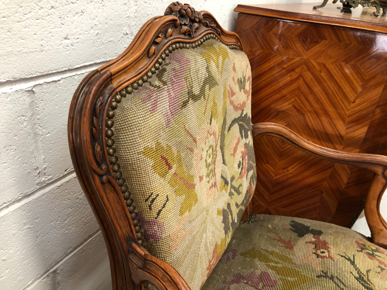 Pair of French Walnut Tapestry covered armchairs. They are in good original detailed condition. Slight wear and tear to fabric but still in good condition please view photos.