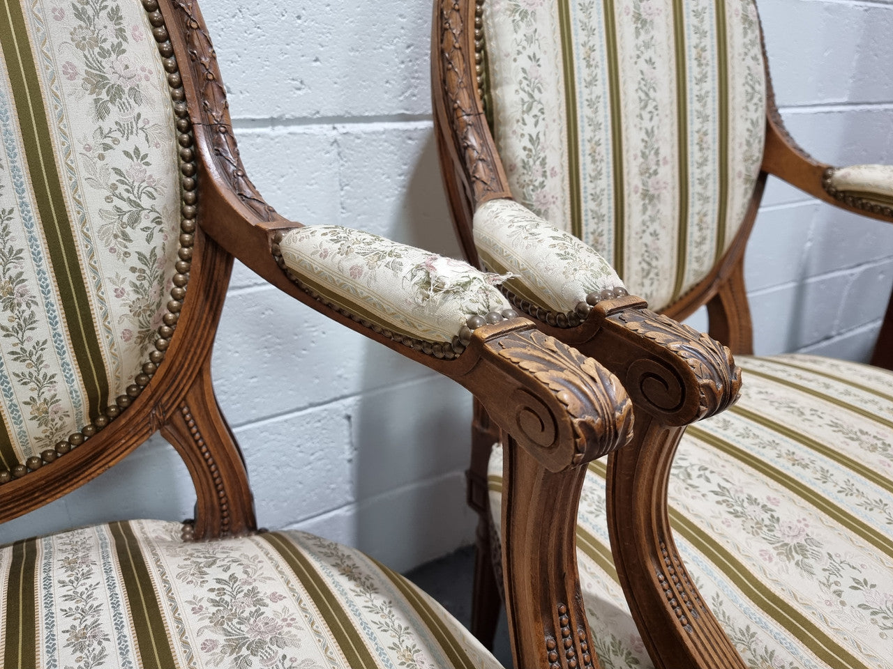 Pair of French Louis XV matching carved armchairs. They are in good overall condition with some slight wear to fabric, please view photos as they help form part of the description.
