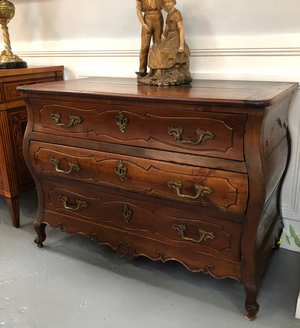 Beautiful 18th Century French all Cherrywood three drawer commode with beautiful ormolu mounts and handles. It is in good original detailed condition.