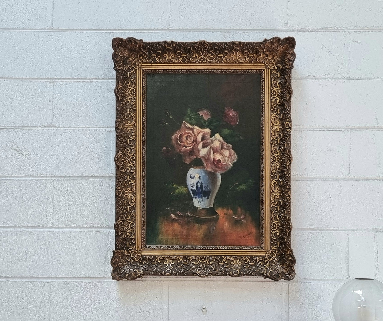 Stunning French signed floral oil on canvas painting of roses in a beautiful decorative frame and in good condition.