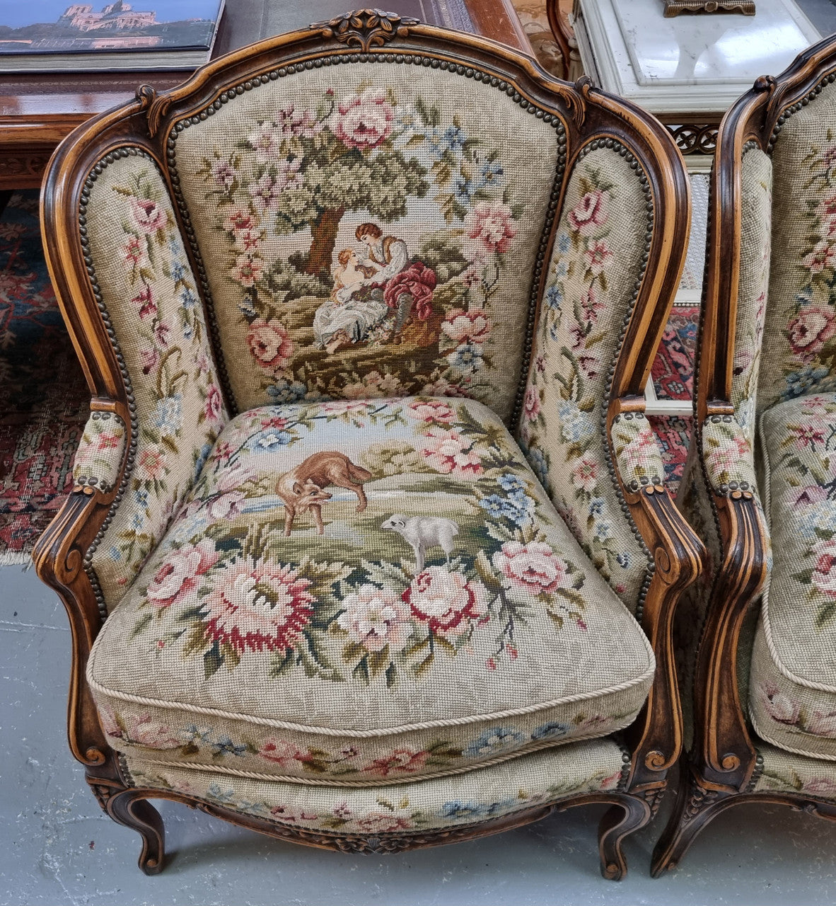 Pair of amazing French Walnut tapestry covered armchairs. The tapestry is in very good condition, please view photos as they form part of the description. Sourced from France and is in good original detailed condition.