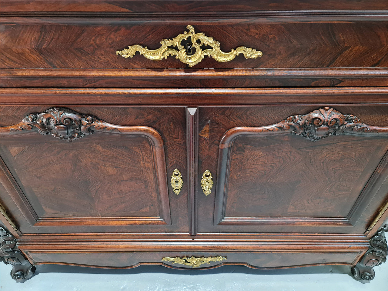 Stunning Rosewood Marble Topped Secretaire with two cupboards. Cupboards open to three fitted drawers and an additional secret drawer beneath the cupboard. All sitting on lovely carved legs and decorated with ormolu mounts. Circa: 1860. In good original detailed condition.