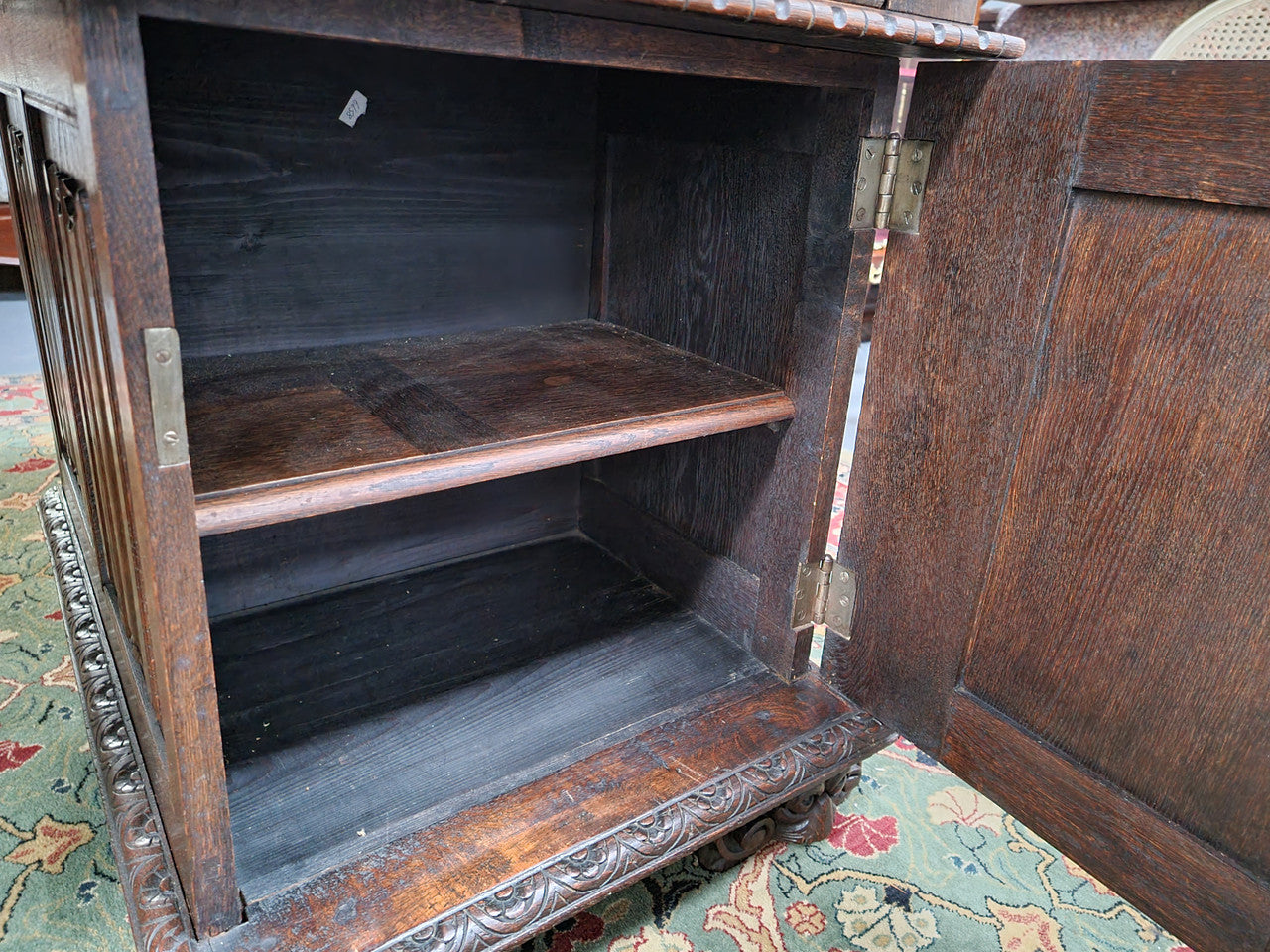 Beautifully carved French Oak early 19th century pedestal desk with 3 drawers, two cupboards and a secret cupboard on the side. There is also a lovely burgundy tooled leather top. In good original detailed condition.