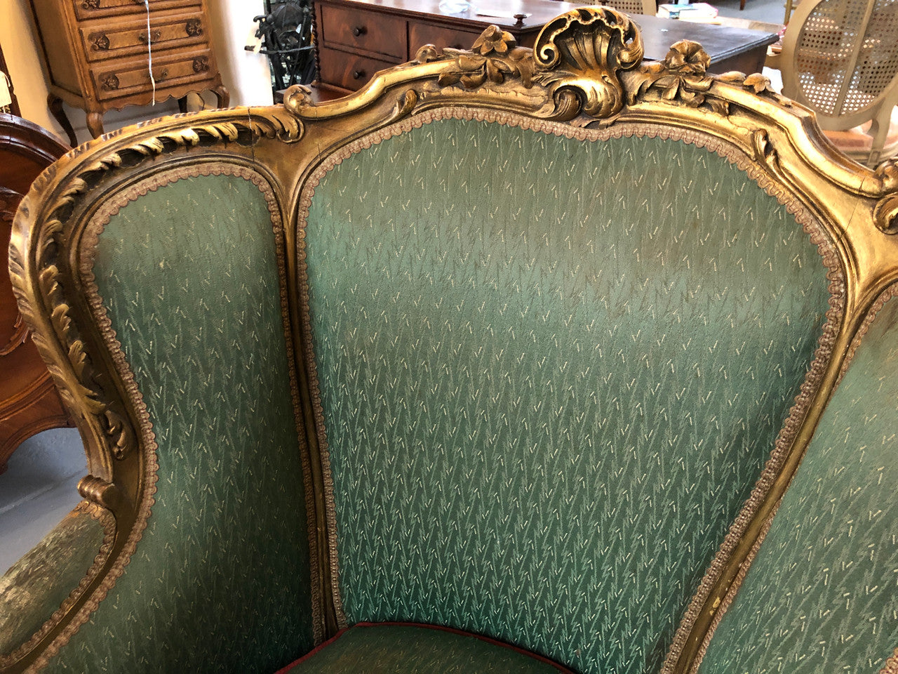 Charming Louis XV glided Walnut chair/carved bergère. This is a very early piece from circa 1800's. It would look amazing reupholstered in a stunning fabric of your choice.