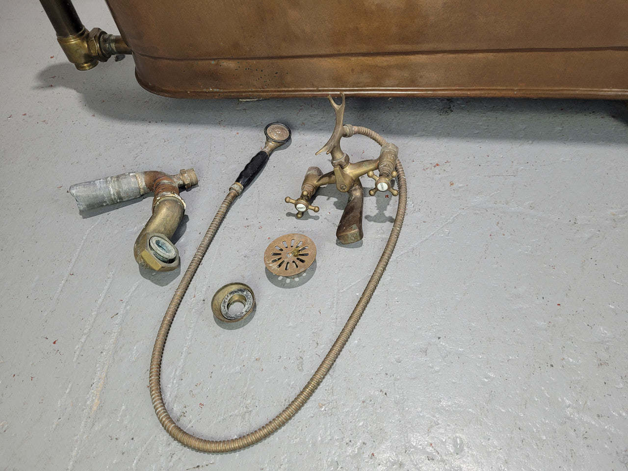 Sourced from France a rare full copper Antique bath tub on feet and includes an overflow, fittings, taps ect. In good original condition.