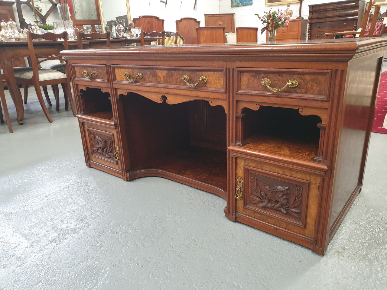 Victorian Burr Walnut ideal TV cabinet. Has plenty of room for a large TV and has plenty of storage space with 3 drawers and 2 cupboards. In good original condition.