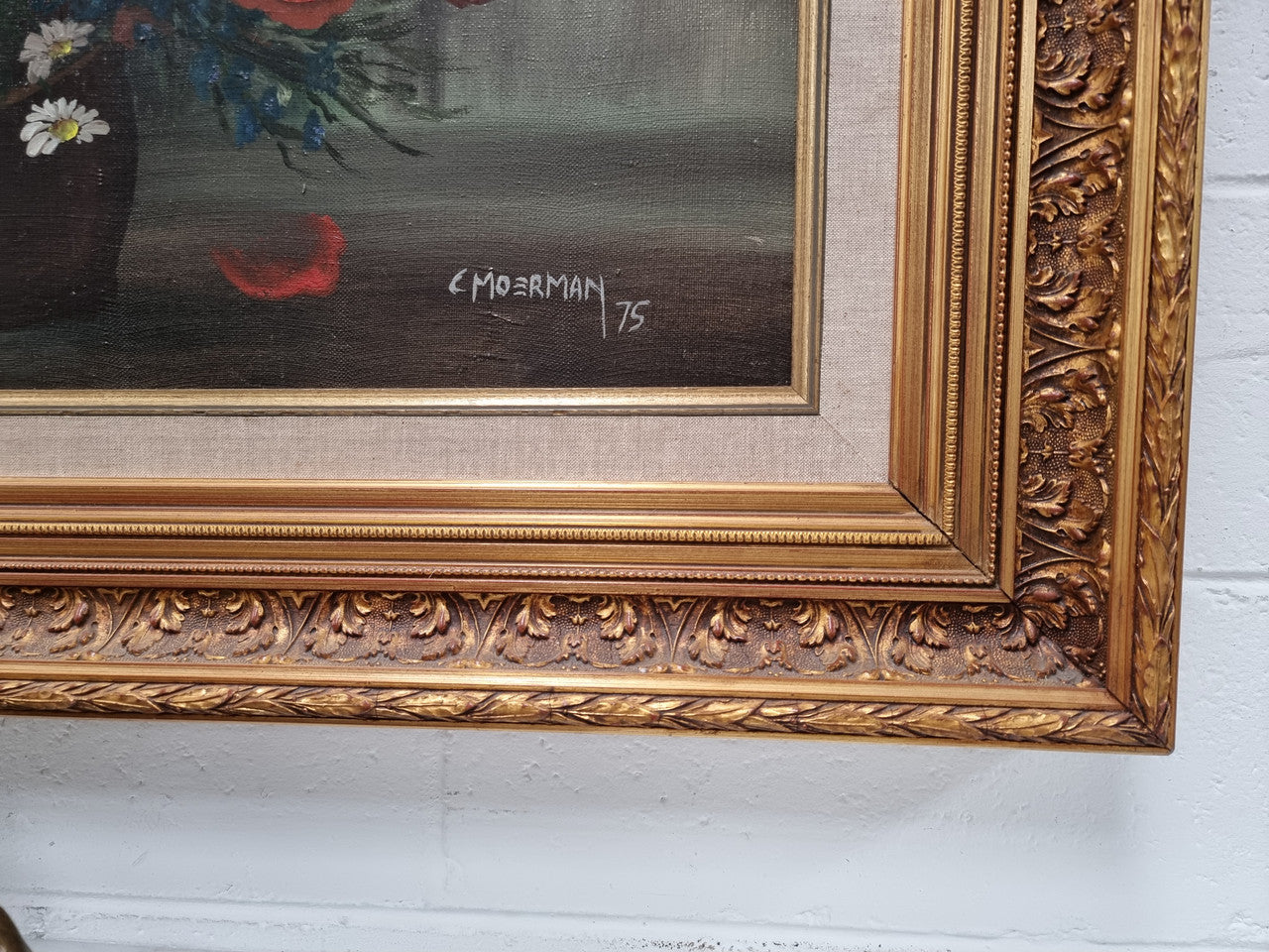 Lovely Vintage signed floral oil on canvas of Poppies and Daisy's and in a decorative gilt frame . In good original detailed condition.