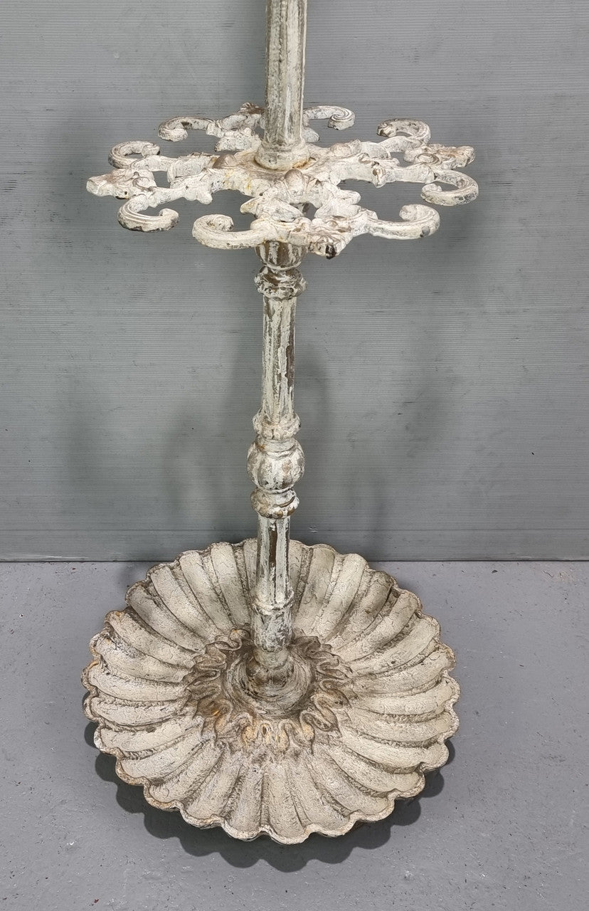 Lovely Antique French cast iron hat /coat/umbrella stand with ten arms, and in good original detailed condition.
