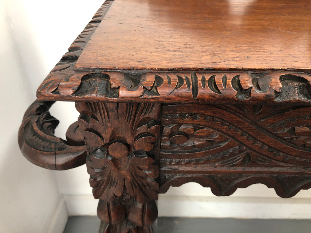 Superb 19th Century Gothic style hall/console table. It has umbrella and walking stick holders on both sides. In good original detailed condition.