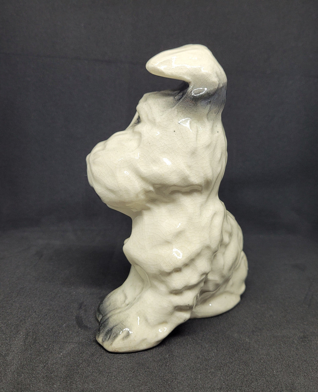 Charming vintage black and cream ceramic dog ornament. In good original condition.