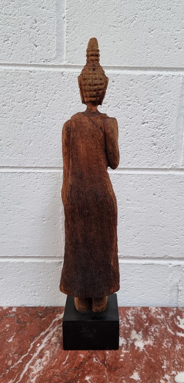 Antique Sukhothai Style Thai carving of a standing Buddha. In good original detailed condition.