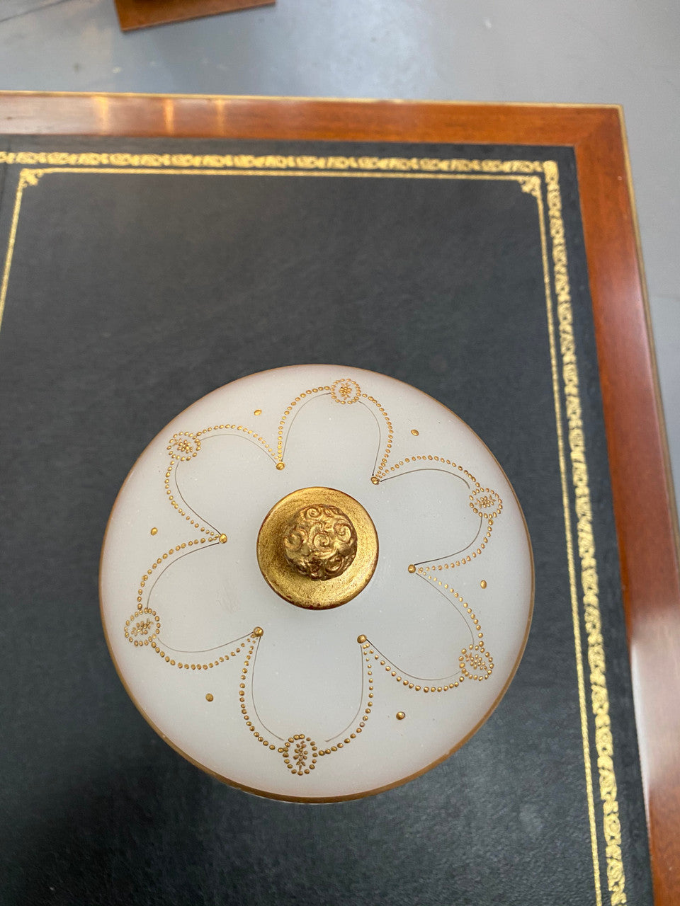 Classical Victorian milk glass & gilt decorated urn/vase. In good condition.