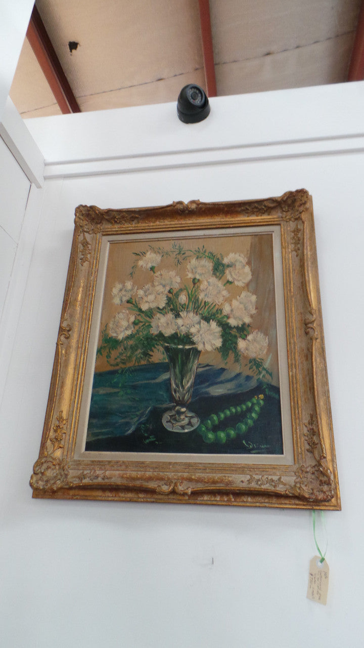 A beautiful impressionist style painting of carnation flowers oil on canvas. It is in a lovely decorative frame. It is in very good original condition.