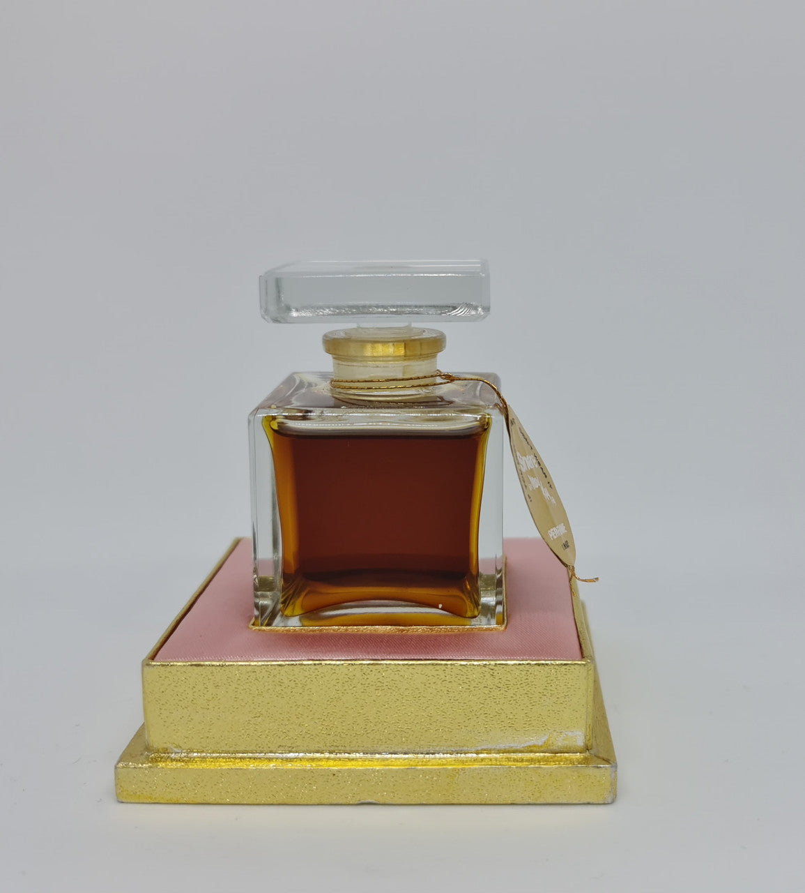 Beautiful Vintage snare "Mary Kay" French bottle of perfume. It is in amazing condition. Comes with pink and gold tray.