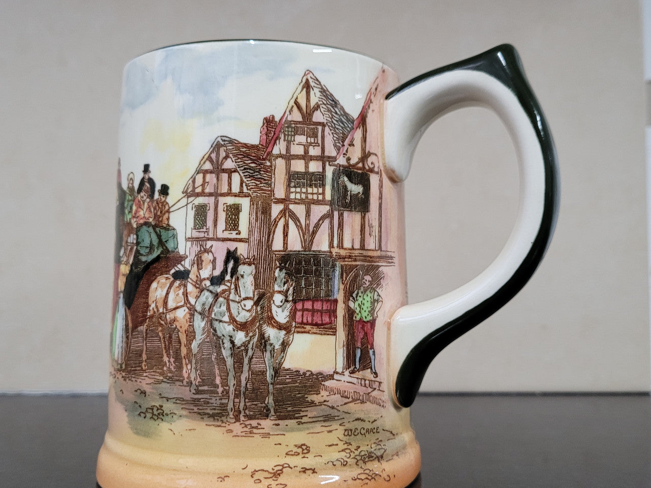 Royal Doulton coaching scene mug. In good original condition please view photos as they help form part of description.