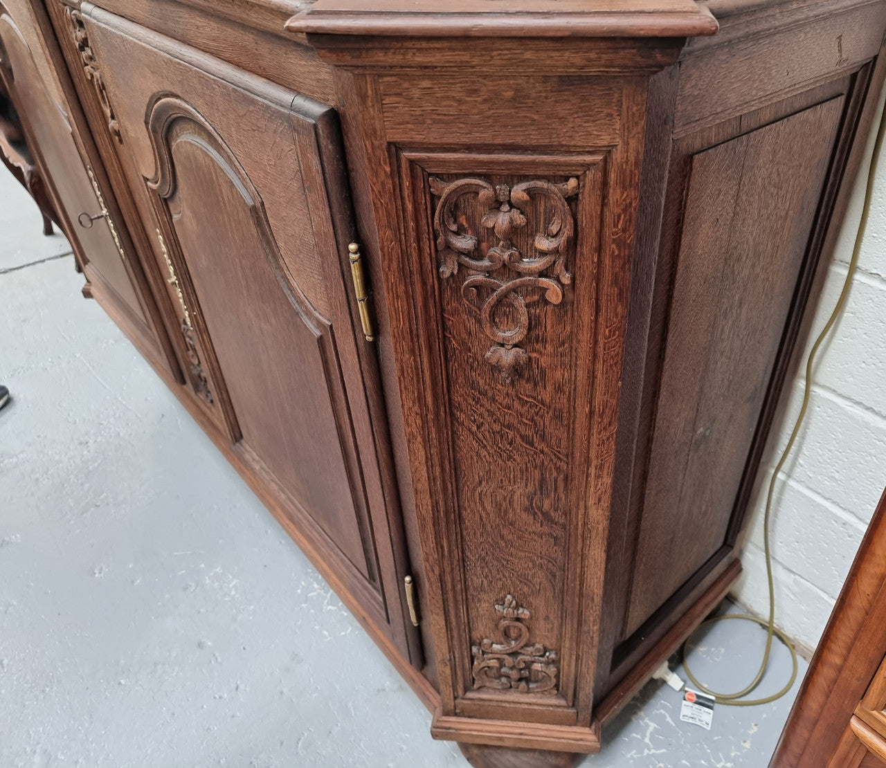 Late 18th Century French Oak carved two door sideboard. In good original detailed condition.