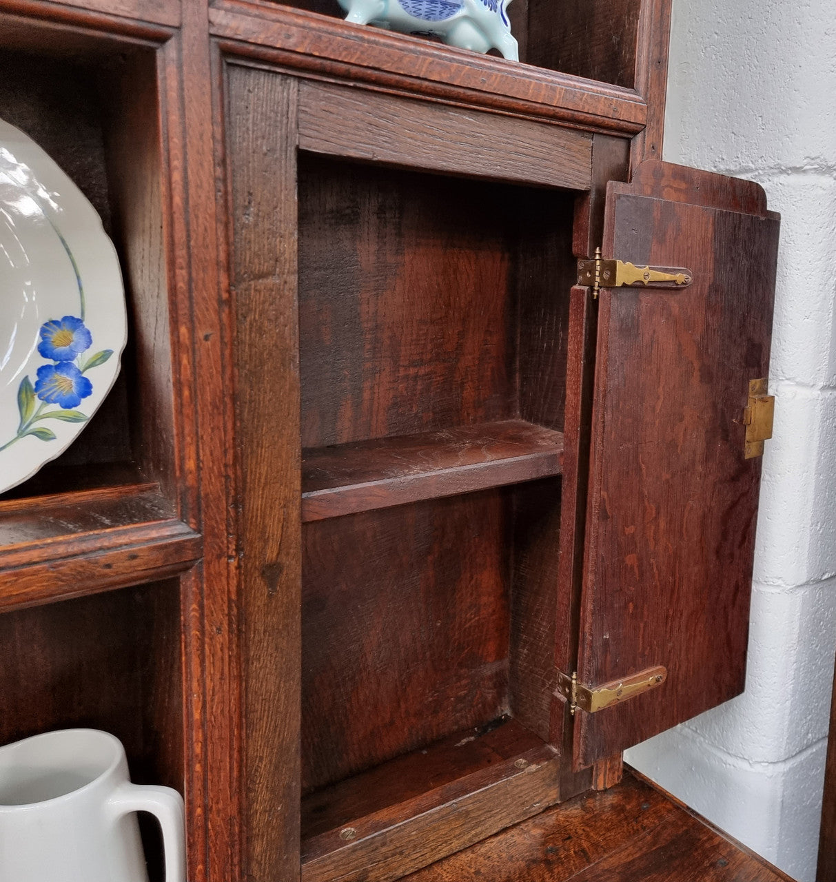 18th Century English Oak Farmhouse dresser of grand proportions. It was sourced in France and not only looks amazing but also has plenty of practical storage space. It is in good original detailed condition.