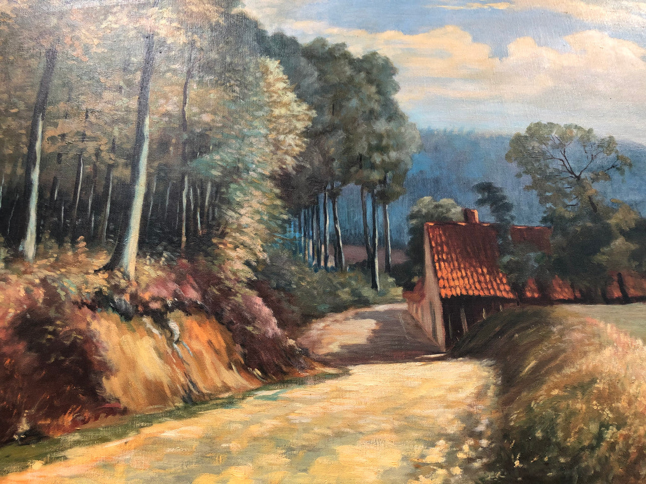 Large French oil on canvas of "country cottage" scene in a beautiful ornate gilt frame. In good original detailed condition.
