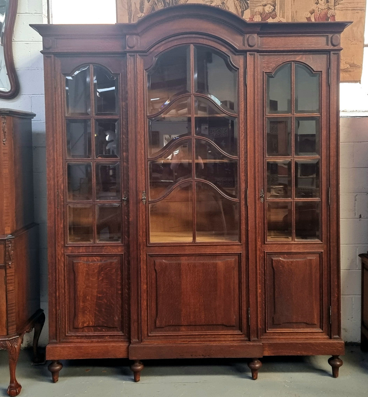 Late 19th Century French Oak three door bookcase. It has fully adjustable shelfs and is in good original detailed condition.