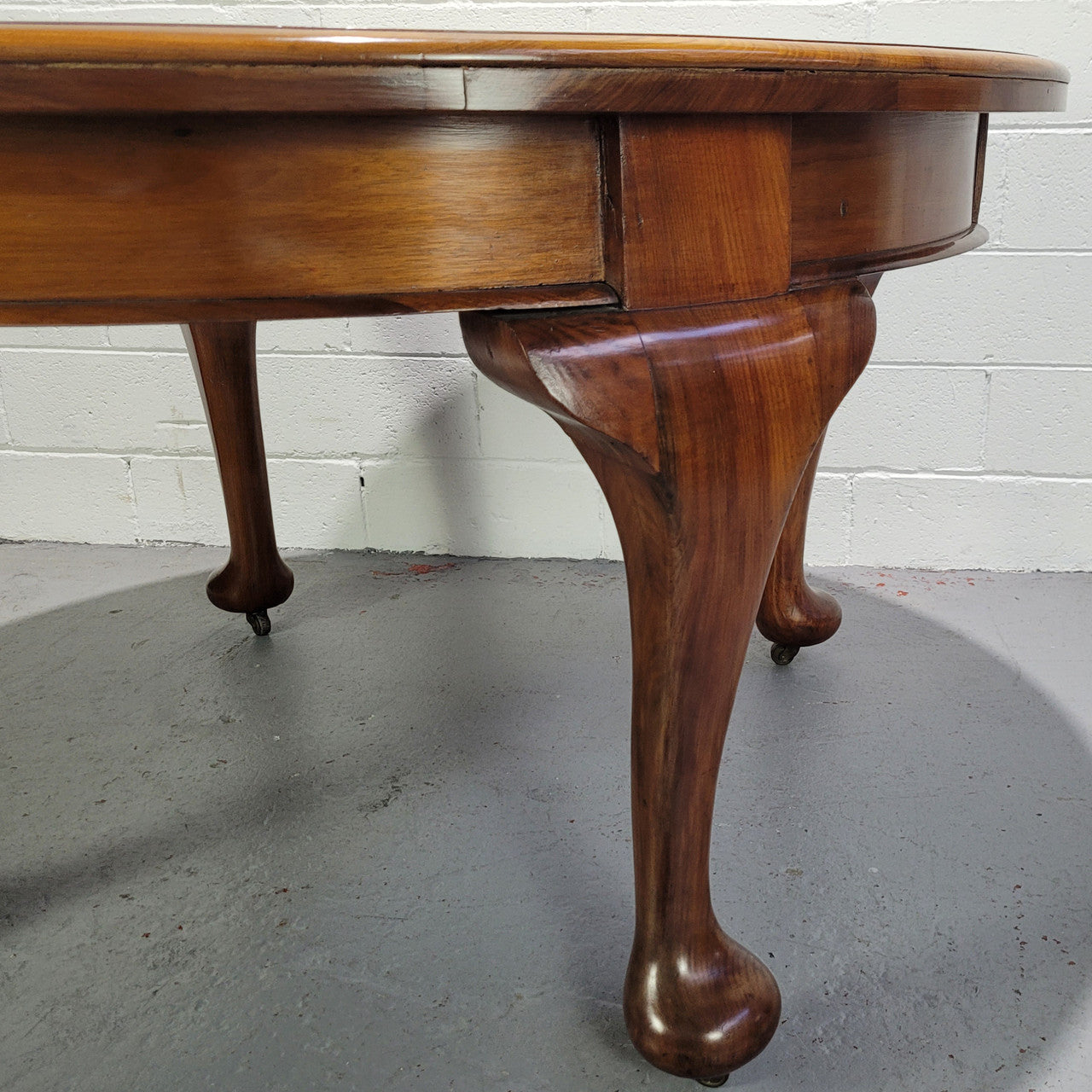 Period blackwood two leaf extension table. It can comfortably sit six people and eight when extend. It is in good original detailed condition.
