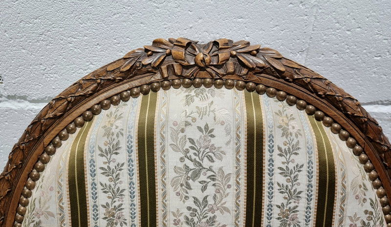 Pair of French Louis XV matching carved armchairs. They are in good overall condition with some slight wear to fabric, please view photos as they help form part of the description.