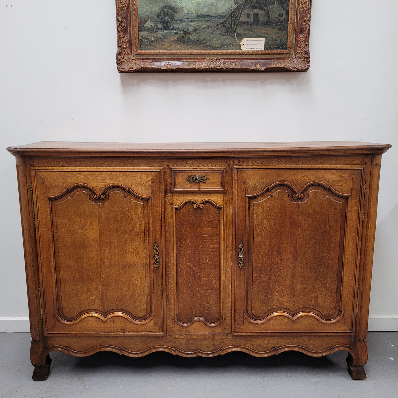 Amazing French Oak early 19th Century two door sideboard with one drawer and two fixed shelves. Sourced from France and in good original detailed condition.