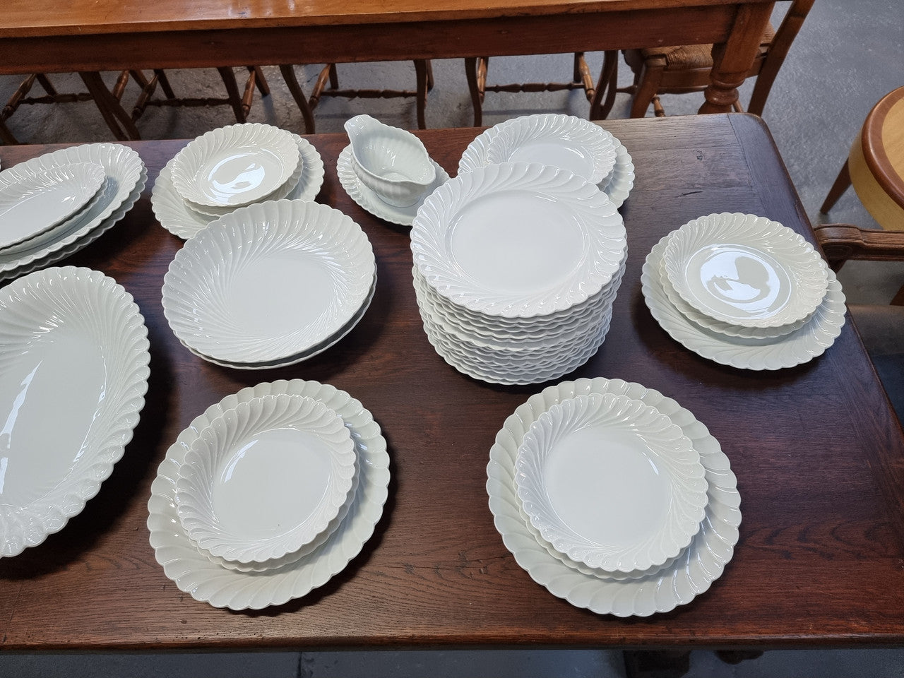Limoge "Haviland" large white part dinner service. Includes some white service with gilt decoration. Although most items are in good condition please note two plates do have small chips. We are able to supply more photos on request.