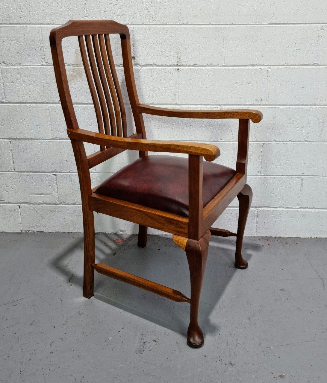 A very comfortable Black Wood Period leather seat armchair. In leather and chair are in good original condition.
