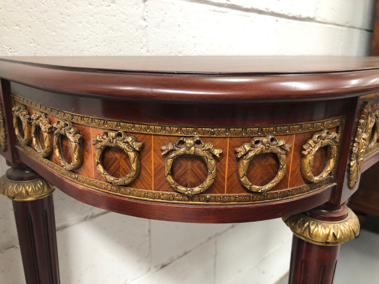 Fully restored decorative French style mahogany console table, with beautiful ormolu mounts and in very good condition.