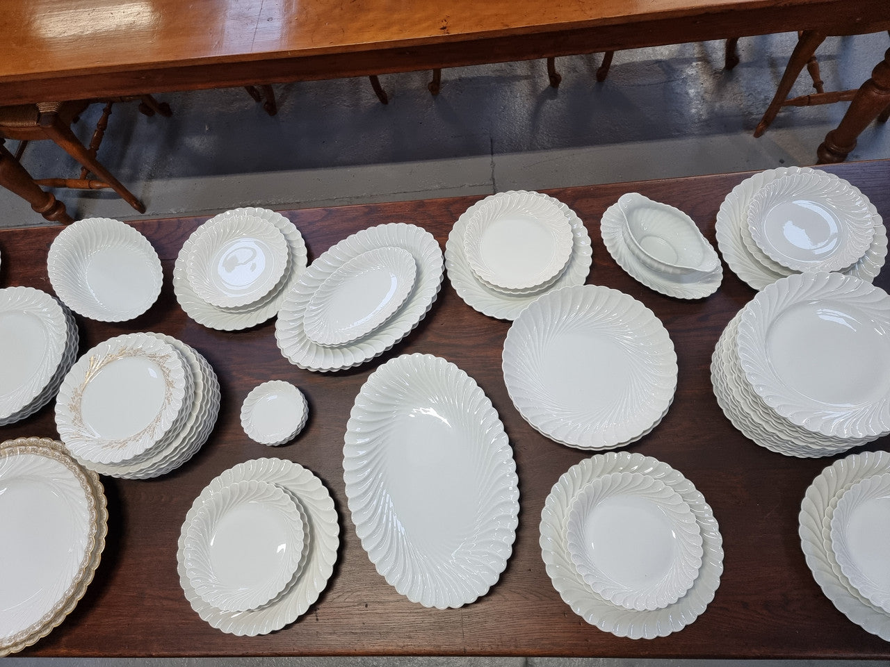 Limoge "Haviland" large white part dinner service. Includes some white service with gilt decoration. Although most items are in good condition please note two plates do have small chips. We are able to supply more photos on request.