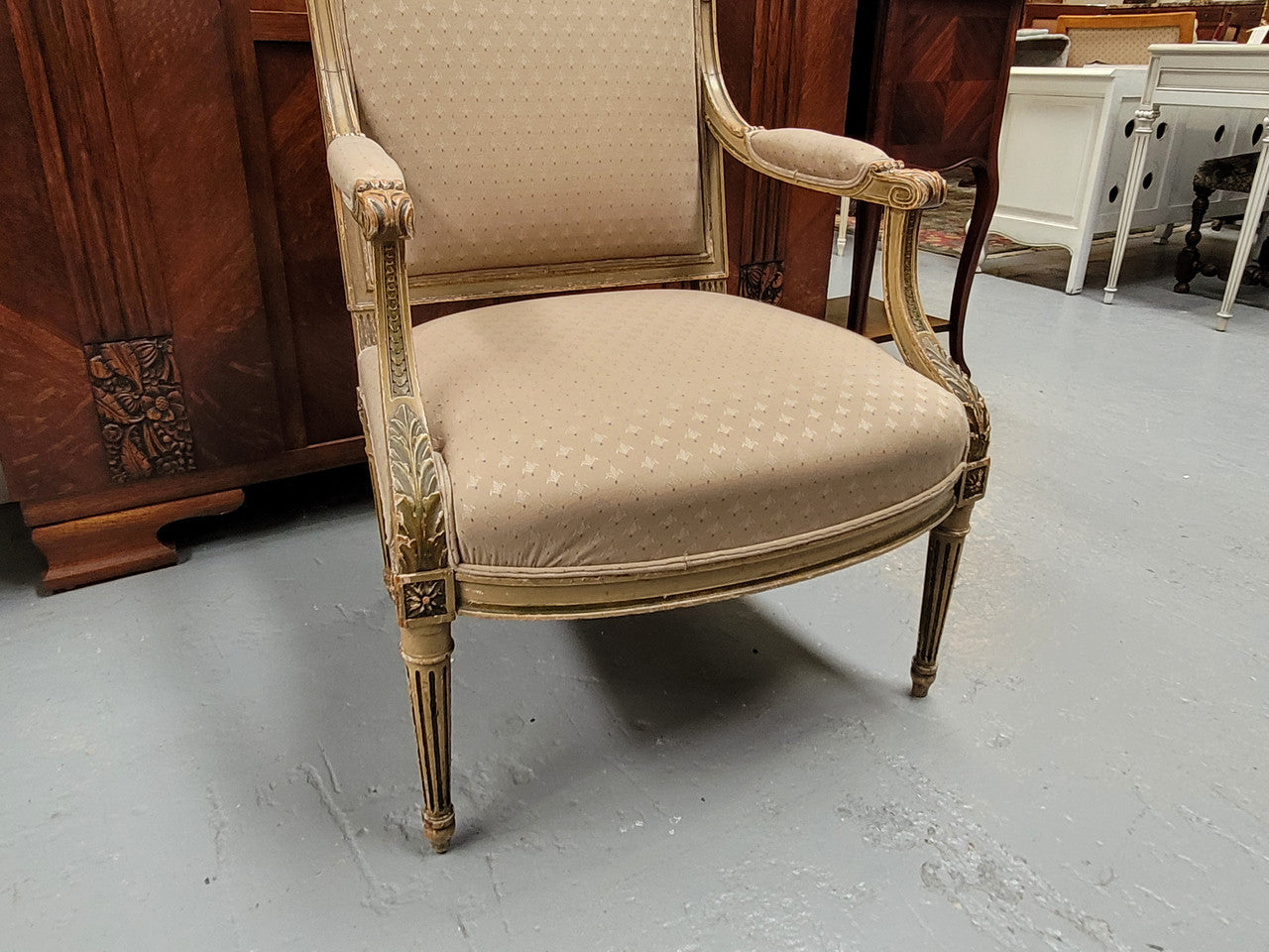 Louis XV style painted Fauteuil chair with attractive fabric upholstery. It has been sourced from France and is in good original detailed condition. The upholstery is in very good used condition, please view photos as they help for part of the description.