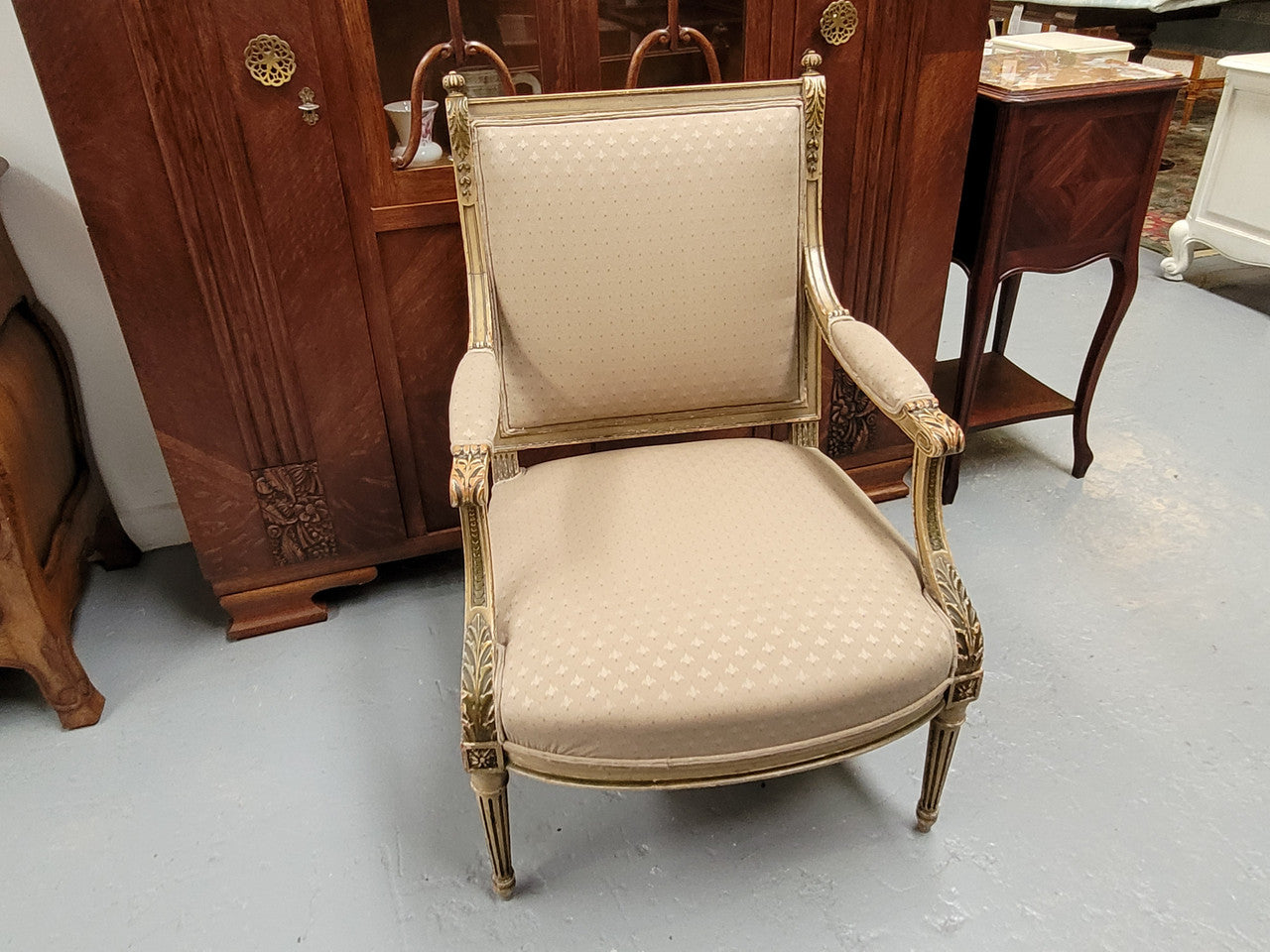 Louis XV style painted Fauteuil chair with attractive fabric upholstery. It has been sourced from France and is in good original detailed condition. The upholstery is in very good used condition, please view photos as they help for part of the description.