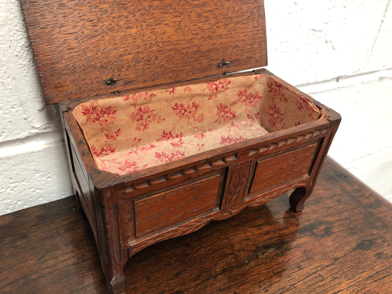 Beautiful Antique oak miniature coffer lined with lovely fabric and would make a fabulous jewellery box . In good condition.