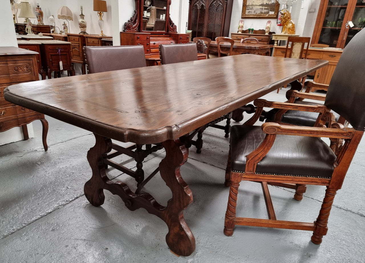 Amazing hard to find French Fruitwood Spanish style 3 meter dining table. Decorative iron work underneath and in good detailed original condition.