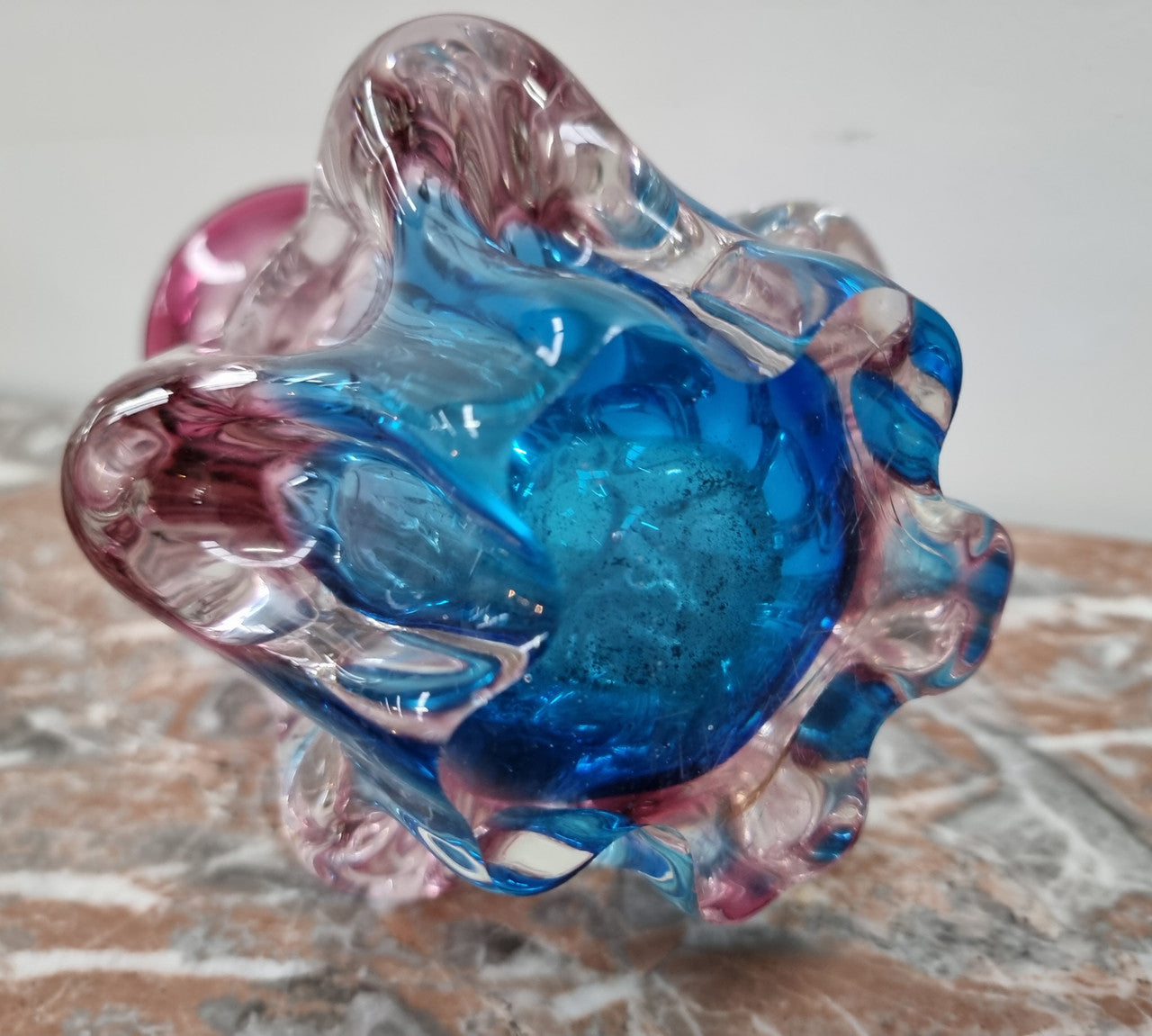 Vintage “Murano” hand made blue and cranberry glass vase. In excellent condition.