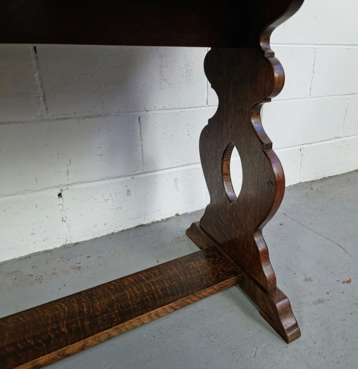 French dark Oak two drawer console table. It has loads of character and is in good original detailed condition.