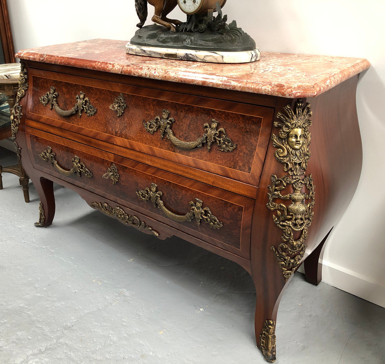 Grande French Louis XIV style Amboyna and walnut two drawer marble top commode, with amazing detailed ormolu mounts, and sienna colour marble top. In good original detailed condition.