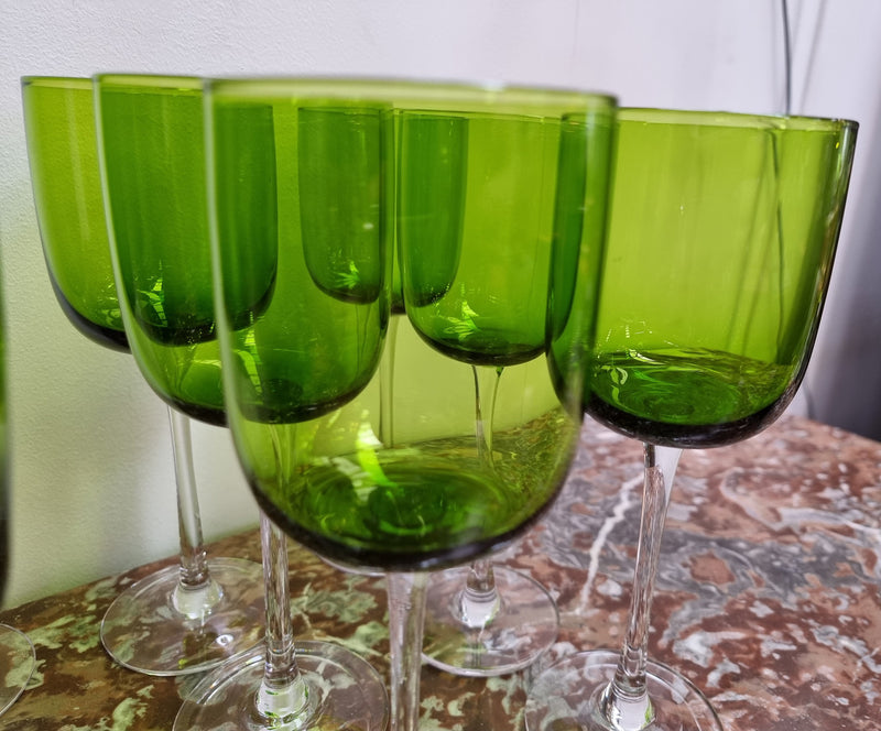 Beautiful set of 12 Vintage emerald green hand made wine glasses. Possibly Italian or French. They are in good original condition with no chips or cracks.