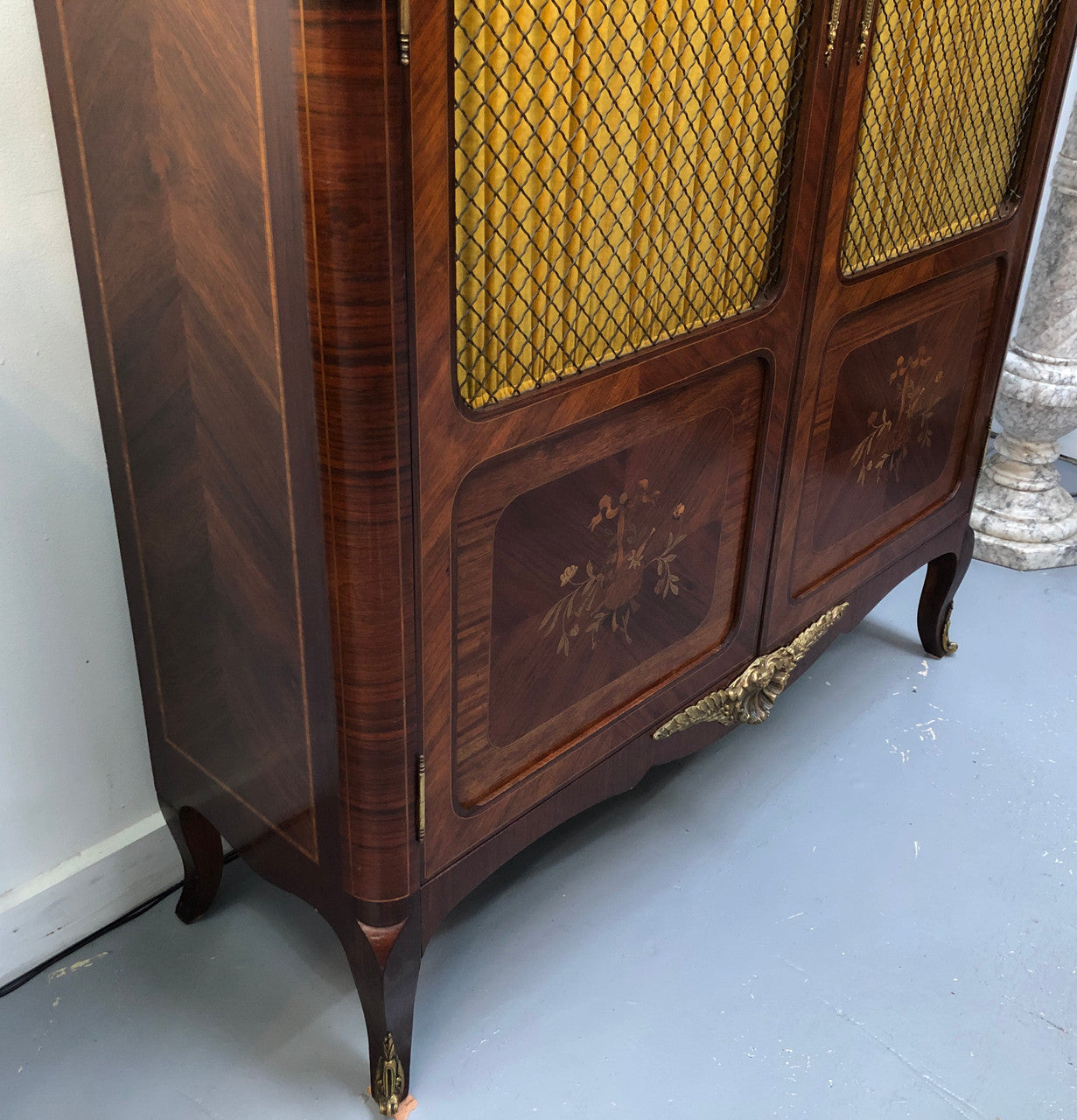 Beautiful 19th Century French Louis XV style Mahogany Blind Bookcase. This piece has lovely inlaid doors and ormolu mounts, marble top and four adjustable shelves. In good original detailed condition.