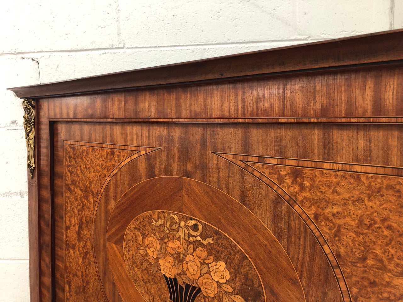 Beautiful Amboyna and Walnut Trumeau mirror. Has lovely parquetry inlay and is in good original condition.