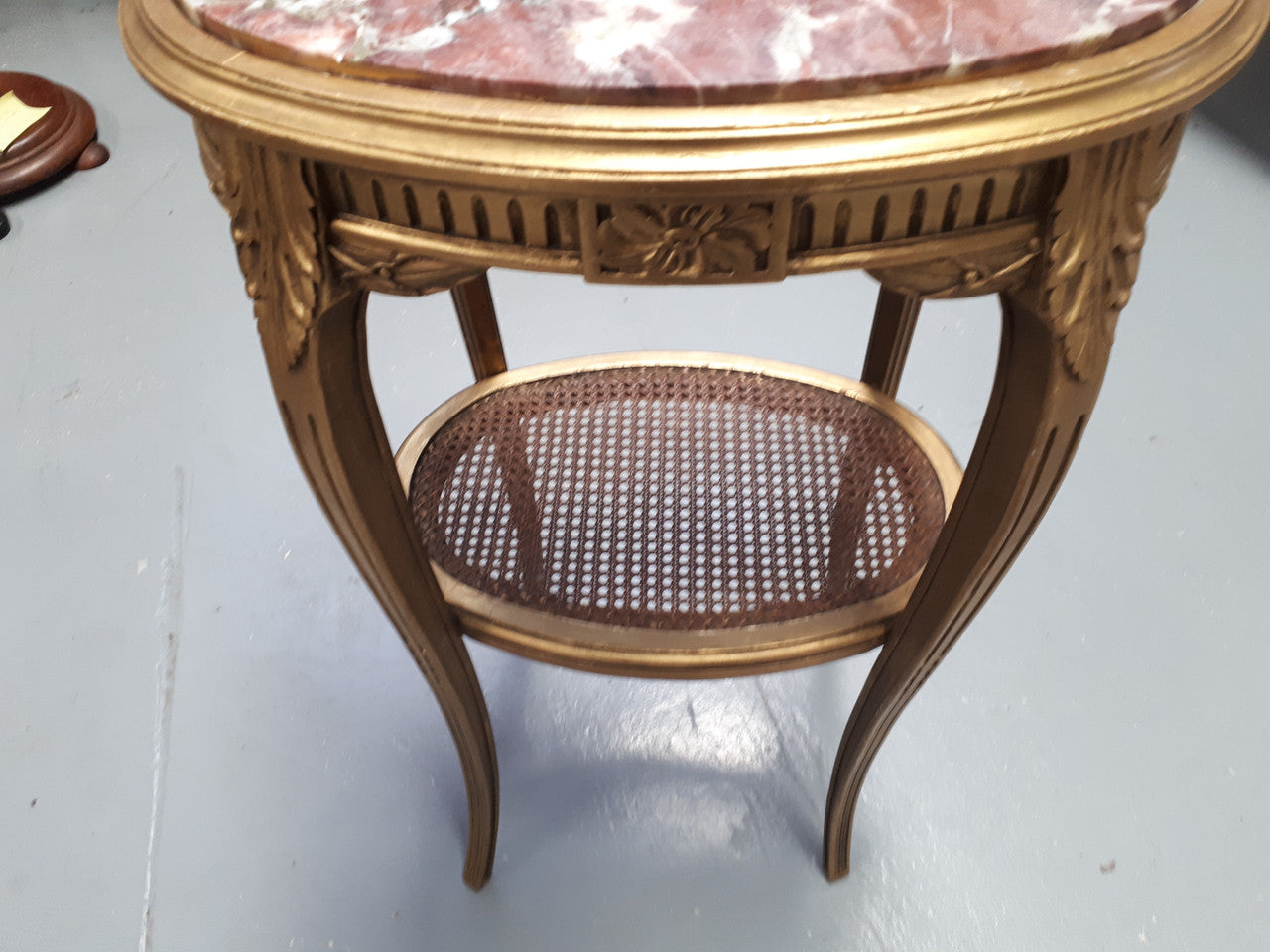 An exceptional & rare 18th century Louis XVI oval inset marble top & giltwood side table with original water gilding. In good restored condition. Circa 1790.